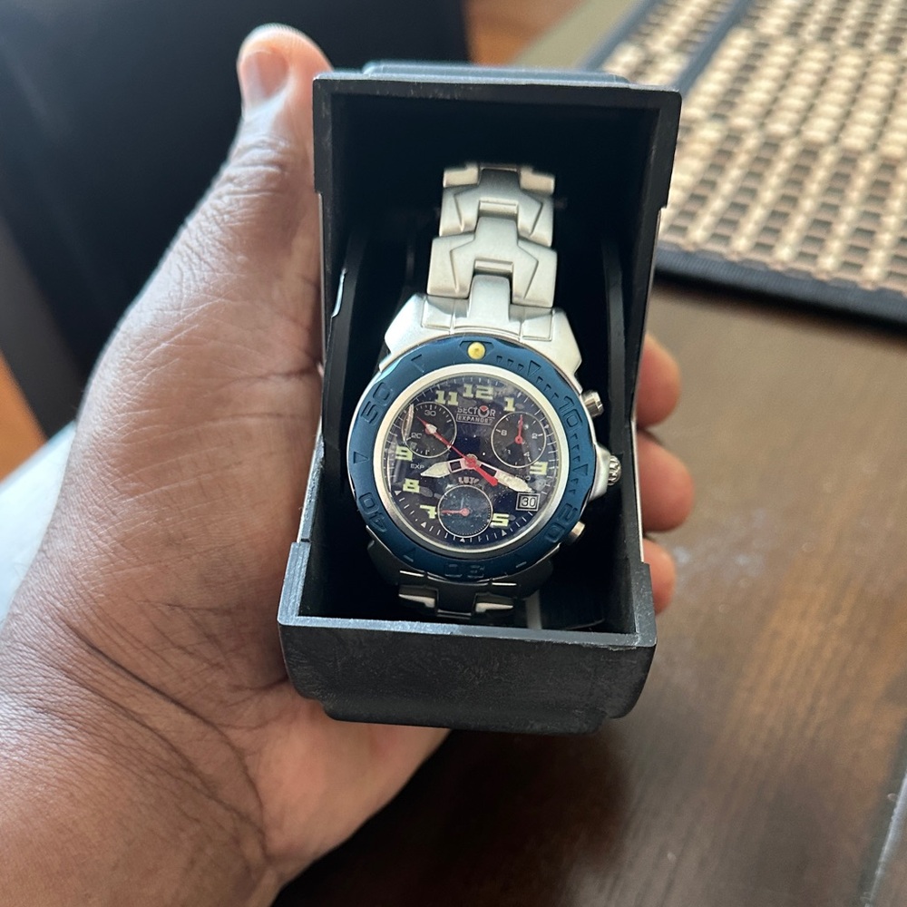 Nixon Men's Silver Watch with Blue Dial